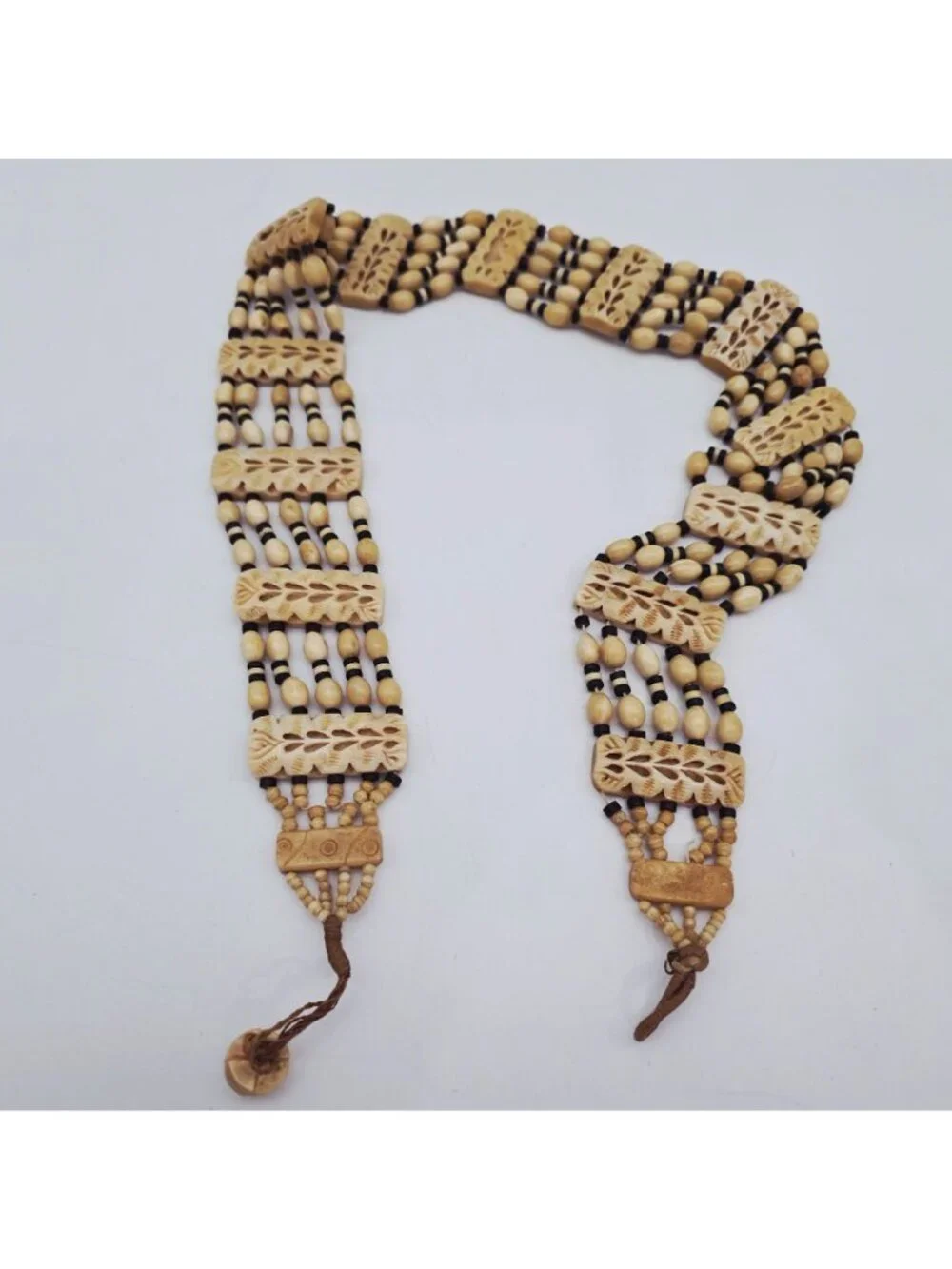 Hand-Carved Bone Beaded Belt With Intricate Leaf Pattern & Button Closure
